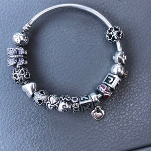 Authentic silver pandora bangle with charms